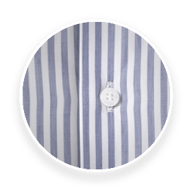 A magnified view of a blue pin-striped INDOCHINO custom shirt with no plackets.